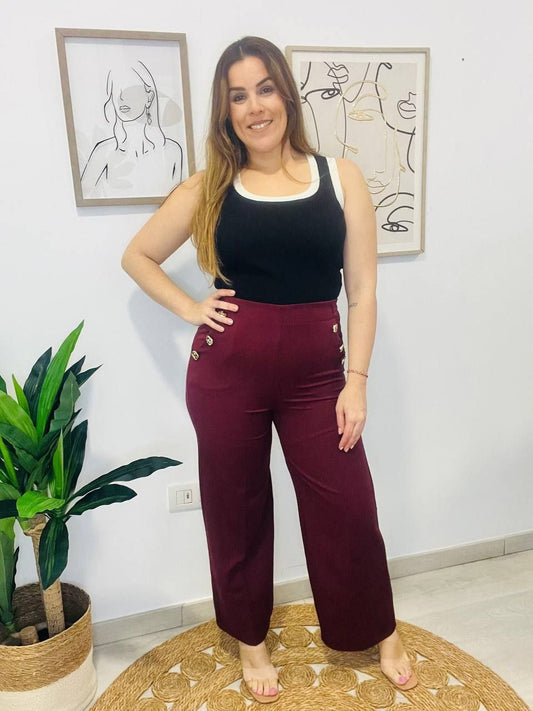 Pantalón con detalles Dorados